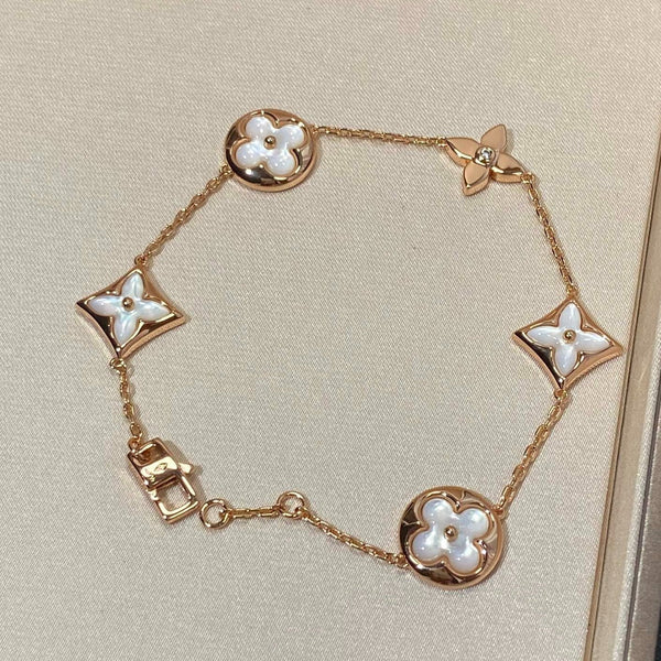 ˇTrend JewelryˇSTAR AND SUN 5 MOTIF MOP PINK GOLD BRACELET