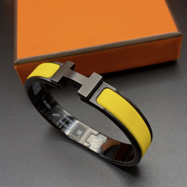 ˇTrend JewelryˇCLIC HM SO SCHWARZ GELB ARMBAND